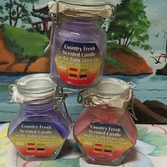 3 Vintage candles 2 lavender and 1 peach scent